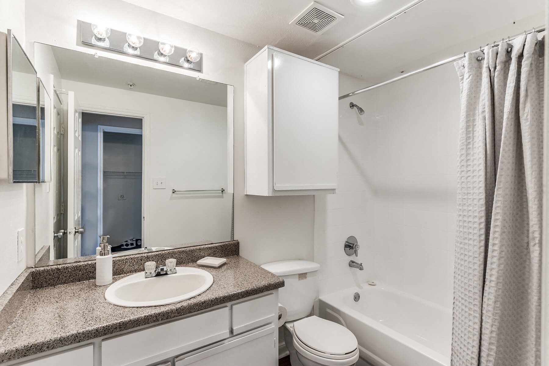 Bathroom shower and tub at Hollow Creek in Conroe TX